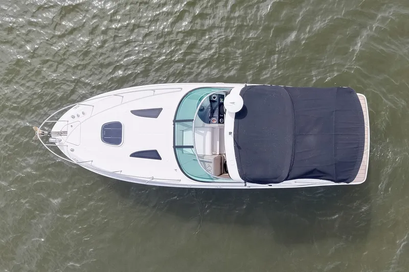 Slide: The Image of Aerial view of 2014 Sea Ray Sundancer 260 boat on water. - 18