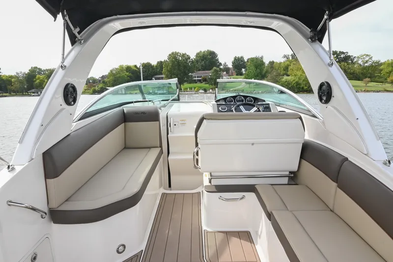 Slide: The Image of Interior view of 2014 Sea Ray Sundancer 260 boat with seating and helm. - 22