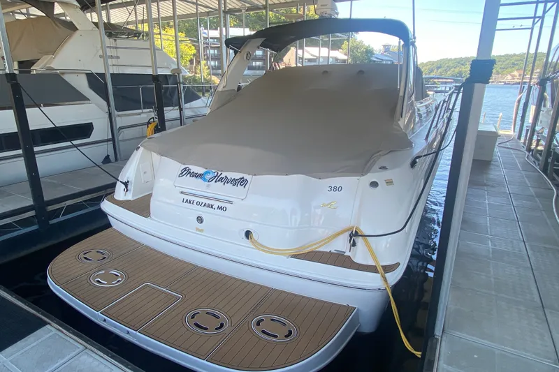 Slide: The Image of 1999 Sea Ray 380 Sundancer docked at Lake Ozark, MO, covered and secured. - 6