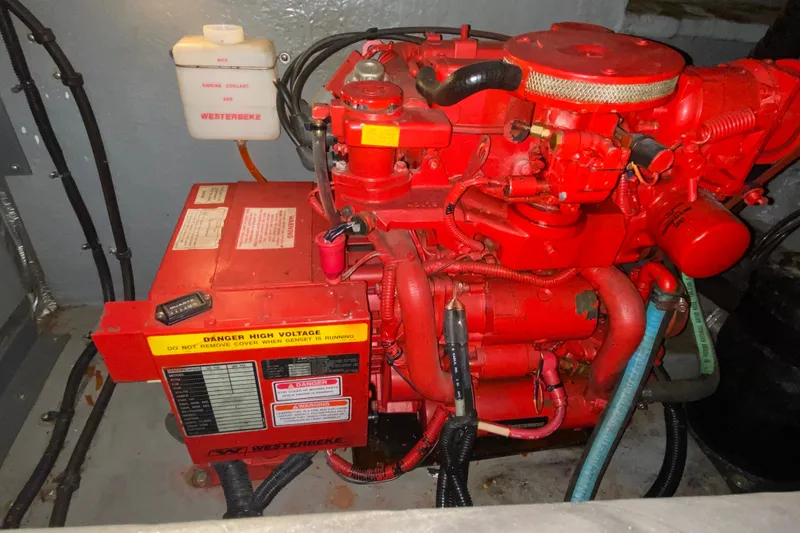 Slide: The Image of Red Westerbeke generator in 1999 Sea Ray 380 Sundancer engine room. - 36