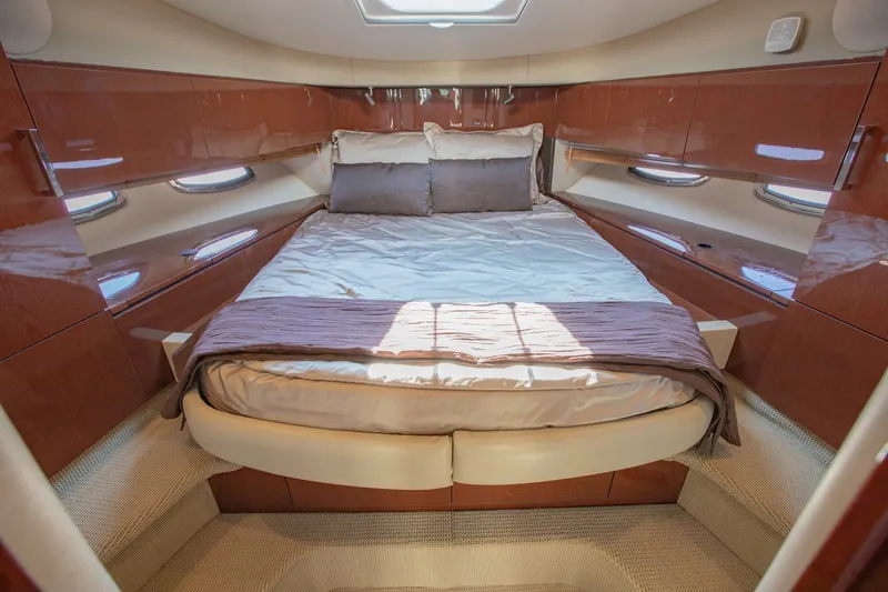 Slide: The Image of Luxurious cabin interior of 2015 Sea Ray 470 Sundancer yacht with cozy bed. - 24