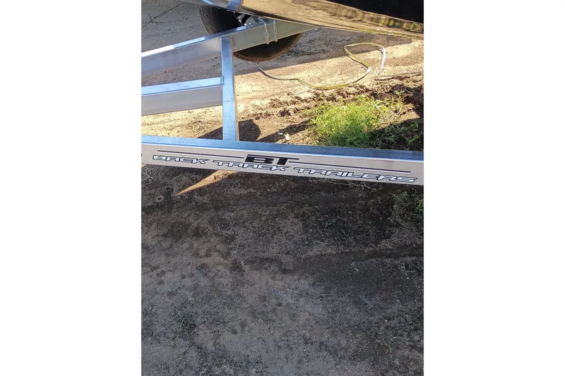 Slide: The Image of Trailer for 2026 EXPRESS BOAT EXPRESS H18C on dirt ground. - 3