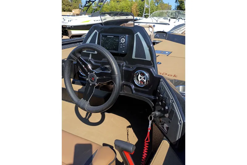 Slide: The Image of Steering console of 2026 EXPRESS BOAT EXPRESS H18C with modern controls and navigation display. - 6