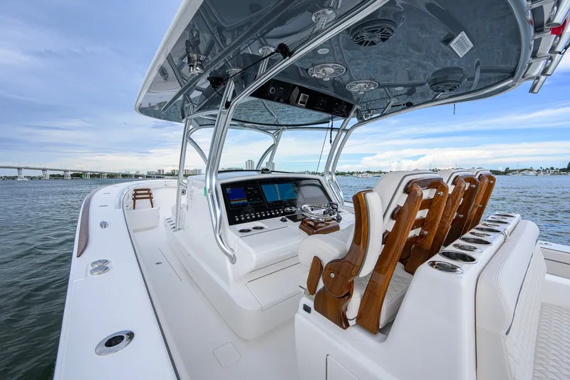 Slide: The Image of Luxurious 2026 Valhalla V-41 boat interior with advanced navigation system and elegant seating. - 16