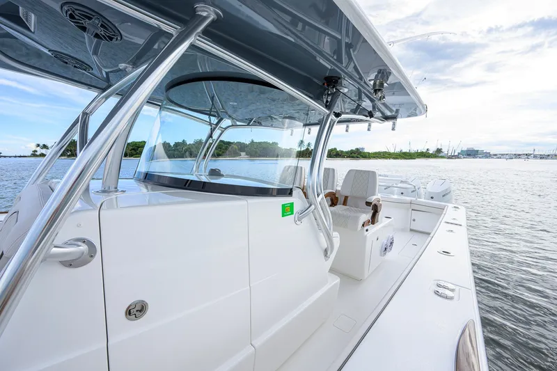 Slide: The Image of 2026 Valhalla V-41 boat with sleek design, spacious deck, and modern features on calm waters. - 22
