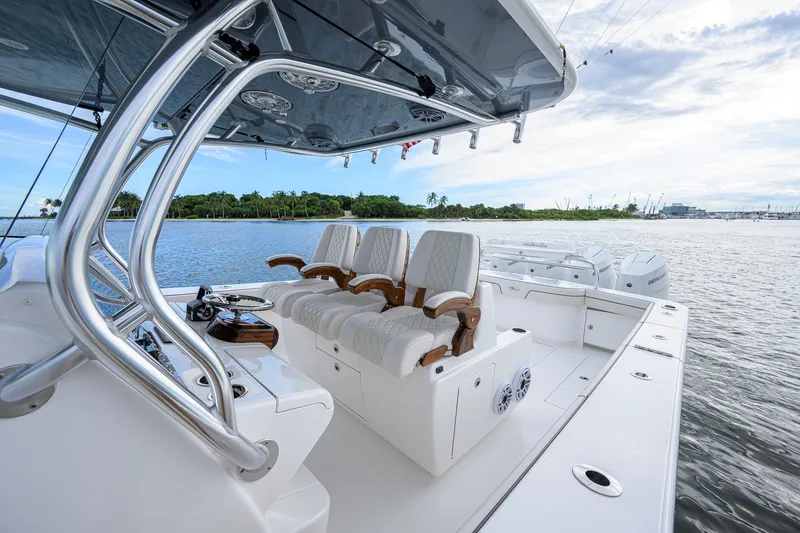Slide: The Image of Luxury Valhalla V-41 boat interior, 2026 model, featuring elegant seating and advanced controls on open water. - 2