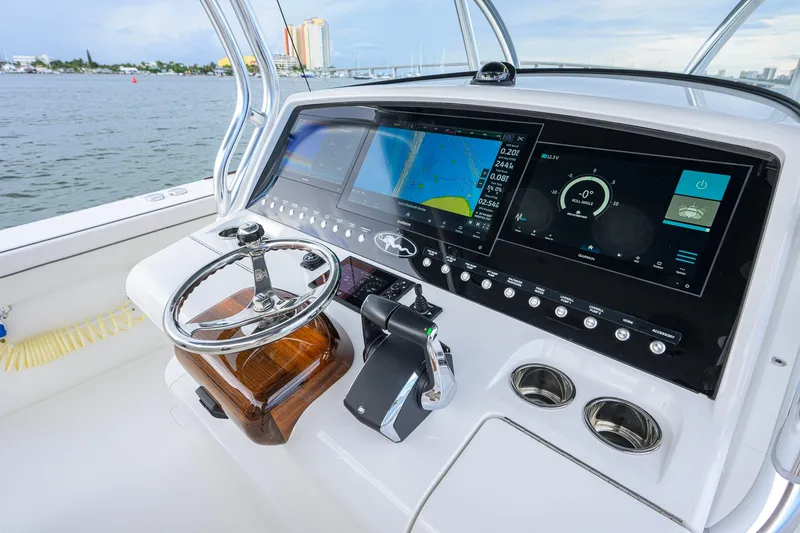 Slide: The Image of Helm of 2026 Valhalla V-41 boat with advanced navigation displays and controls. - 19