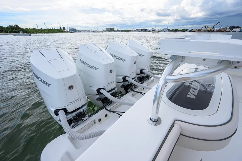 Slide: The Image of Valhalla V-41 2026 boat with four Mercury outboard engines on water. - 62