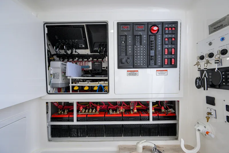 Slide: The Image of Electrical panel and battery setup in a 2026 Valhalla V-41 boat. - 60