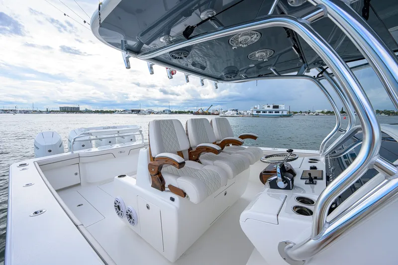Slide: The Image of Luxurious 2026 Valhalla V-41 boat interior with plush seating and modern controls. - 23