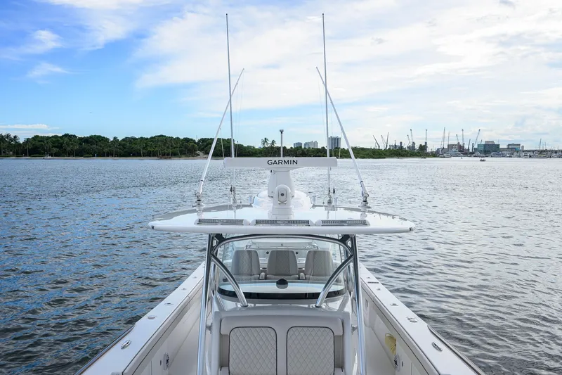 Slide: The Image of Valhalla V-41 boat on water, showcasing sleek design and advanced Garmin navigation system. - 32