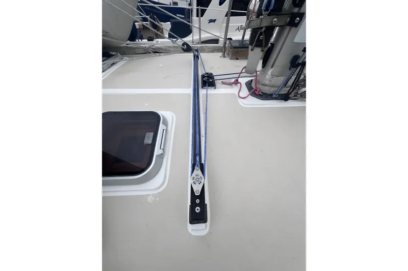 Slide: The Image of Deck of 1995 Cabo Rico 34 sailboat with rigging and hatch. - 23