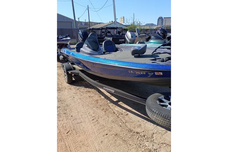 The Image of 2017 Stratos 176 VLO boat on trailer, parked outdoors in a lot. - 0