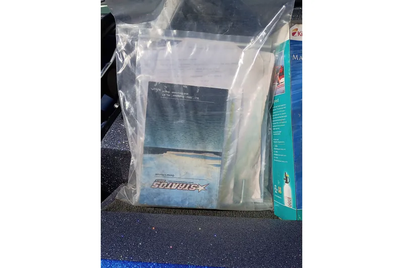 Slide: The Image of Plastic bag containing Stratos 176 VLO 2017 manual and documents. - 4
