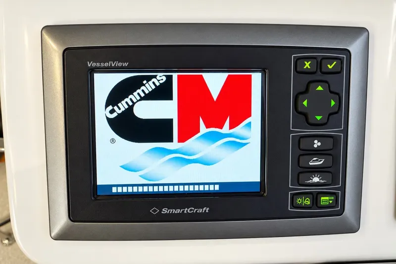 Slide: The Image of SmartCraft VesselView display on 2011 Back Cove 37, featuring Cummins logo and control buttons. - 20