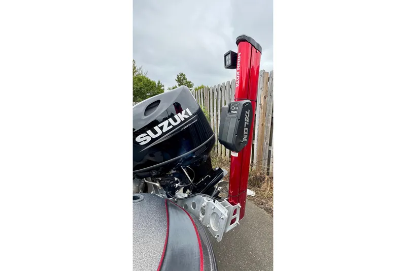 Slide: The Image of 2006 Nitro 482 SC boat with Suzuki engine and Minn Kota Talon anchor. - 3