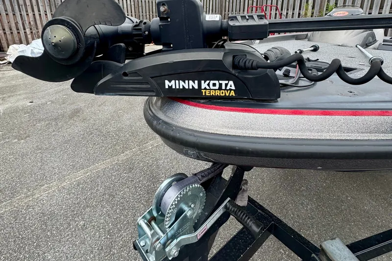 Slide: The Image of 2006 Nitro 482 SC boat with Minn Kota Terrova trolling motor on trailer. - 2