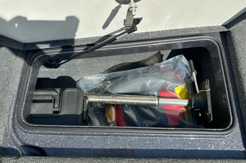 Slide: The Image of Storage compartment of 2025 Ranger Z185 boat with equipment and accessories. - 17