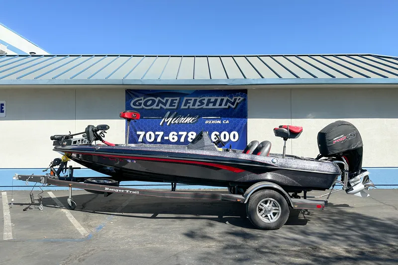 Slide: The Image of 2025 Ranger Z185 boat on trailer at Gone Fishin' Marine dealership. - 1