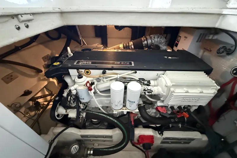 Slide: The Image of Engine room of a 2009 Harbor Master Coastal 520, showcasing detailed mechanical components. - 5