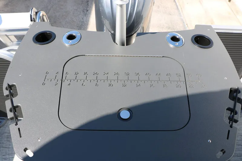 Slide: The Image of The image shows a gray platform with an integrated measuring scale and cup holders. - 47
