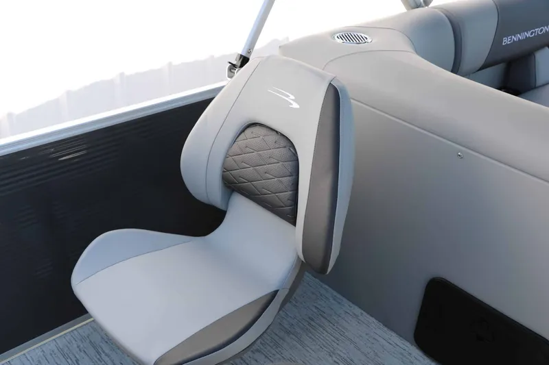 Slide: The Image of Gray upholstered seat with quilted insert on a Bennington boat. - 45