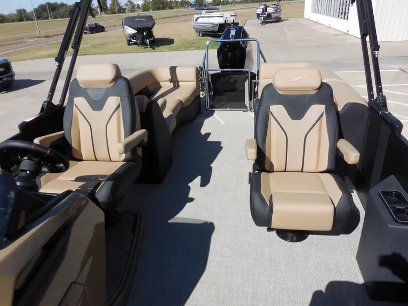 Slide: The Image of The image shows the interior of a 2027 Evotti 725 QL with beige and black seating. - 15
