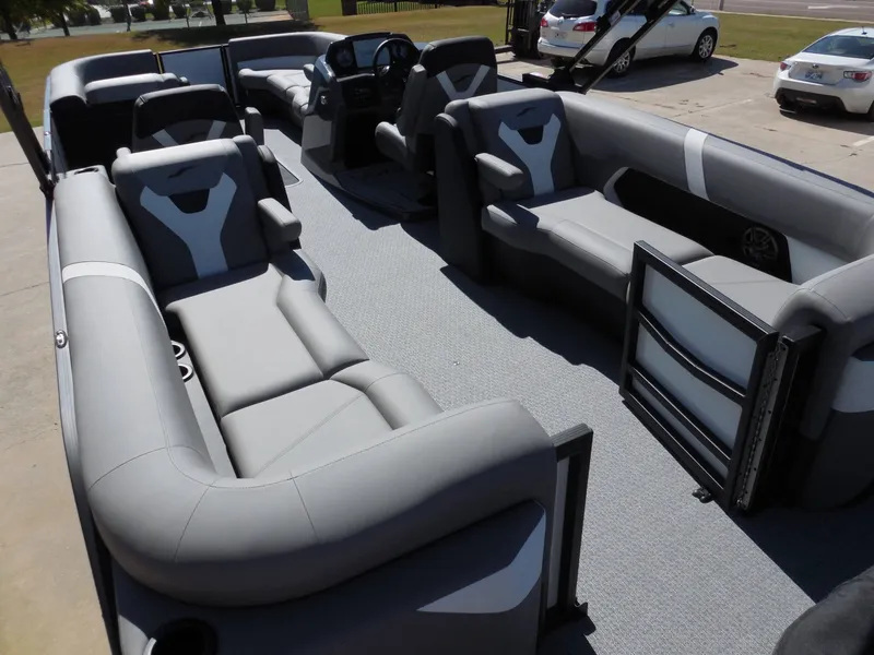 Slide: The Image of The image shows the interior of a 2027 Evotti 525 QL with gray upholstered seating. - 22