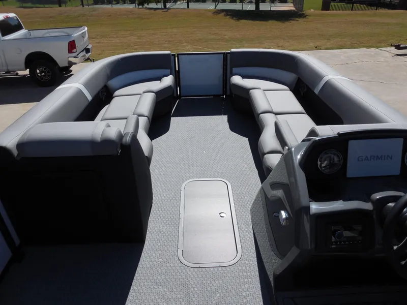 Slide: The Image of The image shows the spacious deck of a 2027 Evotti 525 QL with gray seating. - 24