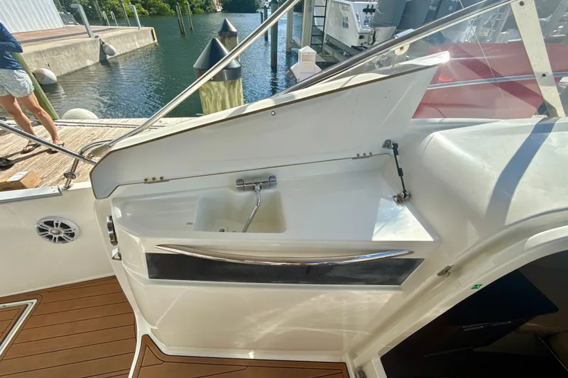 Slide: The Image of Jeanneau Cap Camarat 8.5 WA 2018 boat sink area with dockside view. - 10