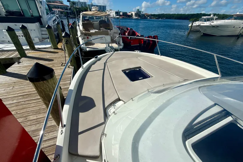 Slide: The Image of 2018 Jeanneau Cap Camarat 8.5 WA docked at marina, sunny day, calm waters. - 20