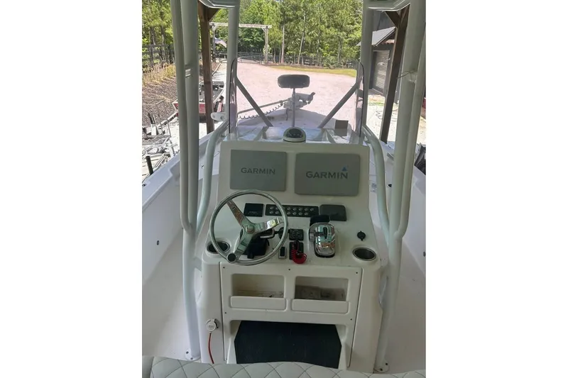 Slide: The Image of 2020 Blue Wave 2600 PureBay boat dashboard with Garmin navigation system. - 7