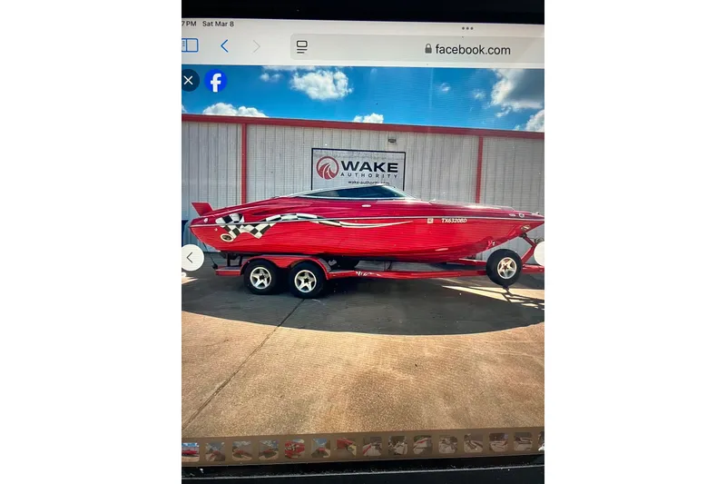 The Image of Red 2007 Crownline 23 SS boat on trailer, parked outside Wake Authority building. - 0