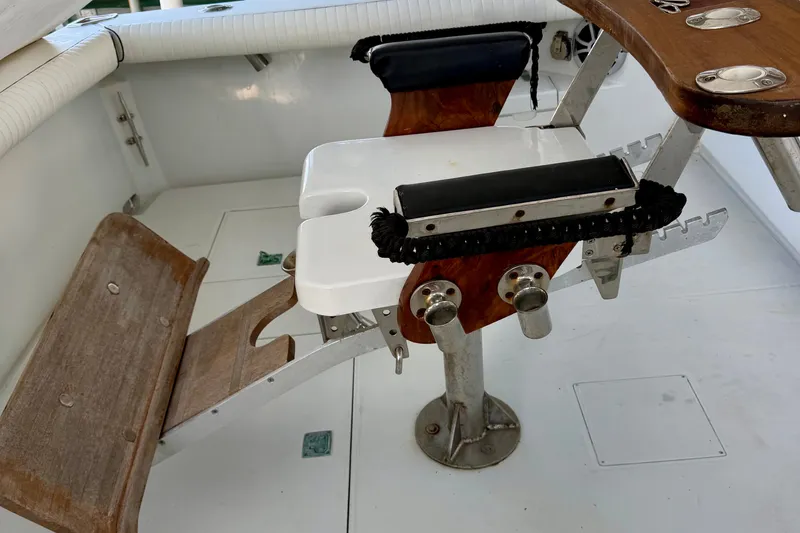 Slide: The Image of Fishing chair setup on a 1995 Cabo 35 Express boat deck. - 13