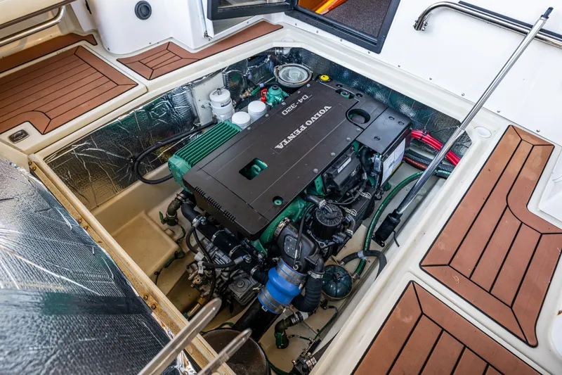 Slide: The Image of Engine compartment of 2023 Ranger Tugs R-29 CB with Volvo Penta motor. - 31