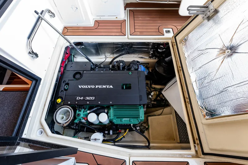 Slide: The Image of Engine compartment of 2023 Ranger Tugs R-29 CB with Volvo Penta D4-320 engine. - 28