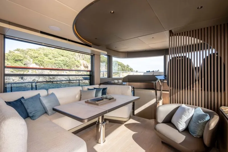 Slide: The Image of Luxurious salon of the Absolute Navetta 58 with elegant furnishings and panoramic sea views. - 11