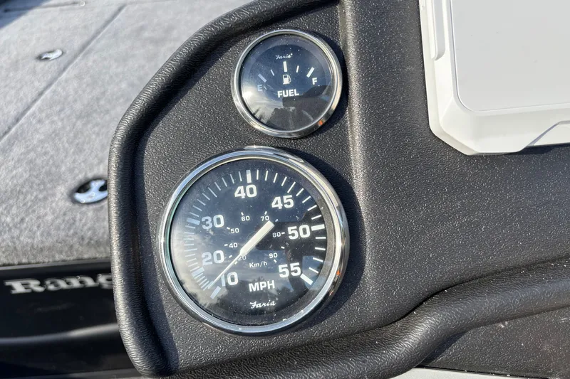 Slide: The Image of Dashboard of 2027 Ranger RT188 boat showing speedometer and fuel gauge. - 8