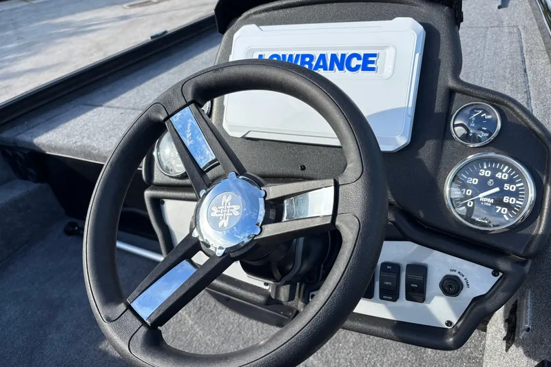 Slide: The Image of Steering wheel and dashboard of 2027 Ranger RT188 boat with Lowrance display. - 5