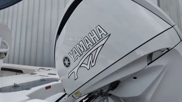 Slide: The Image of Close-up of a Yamaha outboard motor on a Tidewater 2500 Carolina Bay boat. - 18