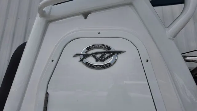 Slide: The Image of Close-up of the logo on a Tidewater 2500 Carolina Bay boat. - 15