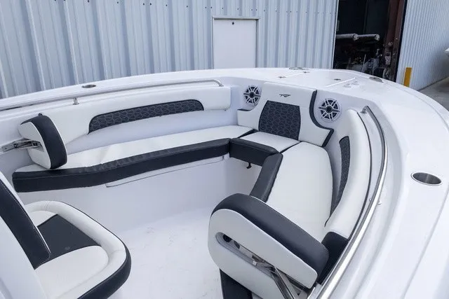 Slide: The Image of The 2027 Tidewater 232 CC Adventure features a sleek, cushioned seating arrangement in the bow area. - 5