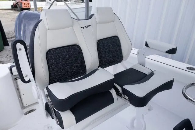 Slide: The Image of The 2027 Tidewater 232 CC Adventure seats are cushioned, offering comfort and style. - 11