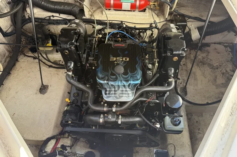 Slide: The Image of Engine compartment of a 2009 Sea Ray 230 Sundancer with a 350 MPI engine. - 14