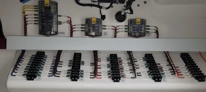 Slide: The Image of Electrical wiring panel of 2023 Mag Bay 33 CC boat. - 38