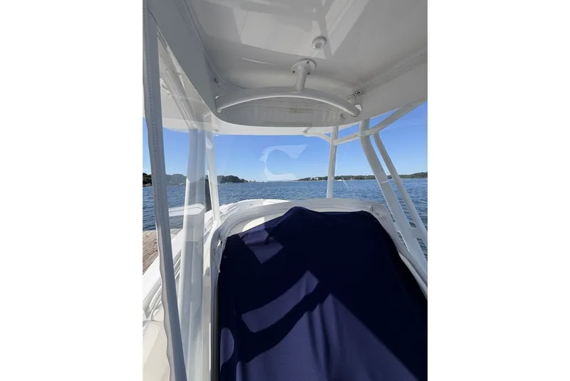 Slide: The Image of 2015 Regulator 25 boat interior with ocean view and clear blue sky. - 17