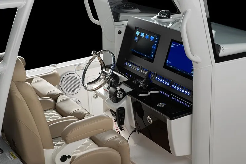 Slide: The Image of Manufacturer Provided Image: 2022 Everglades 365 Center Console helm with dual displays and leather seats. - 32