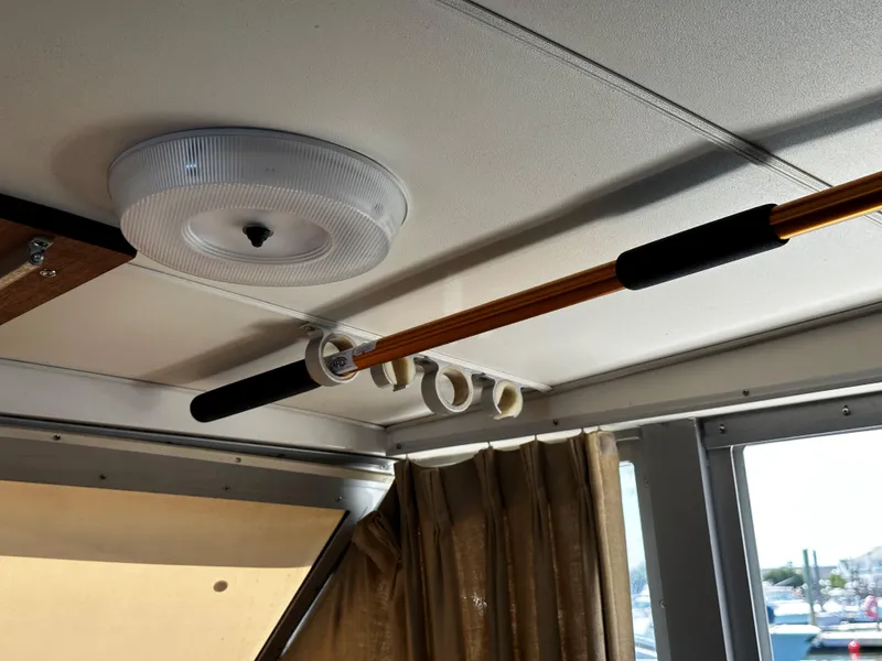 Slide: The Image of Fishing rod holder inside a 1980 Bertram 33 Sport Fisherman boat. - 9