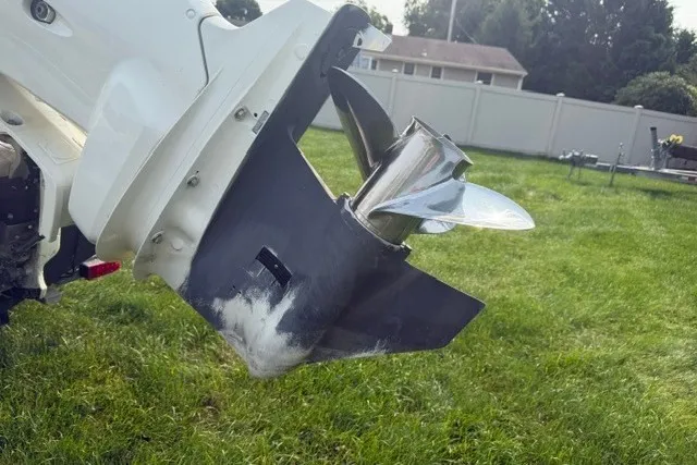 Slide: The Image of Outboard motor propeller of 2021 Bulls Bay 230 Center Console on grass. - 38