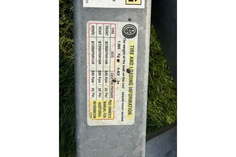 Slide: The Image of Tire and loading information label on Bulls Bay 230 Center Console, 2021 model. - 43